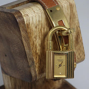 The Famous Hermès Kelly Watch - Brown Leather & Gold