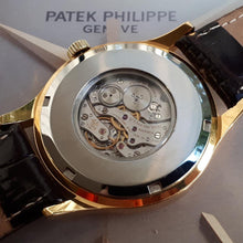 Patek Philippe - Custom World Time Watch - Yellow Gilted Gold - Cal. 177 Movement with Original Solid Gold Buckle