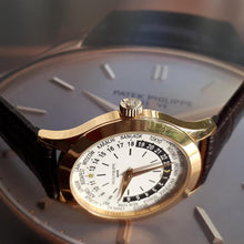 Patek Philippe - Custom World Time Watch - Yellow Gilted Gold - Cal. 177 Movement with Original Solid Gold Buckle
